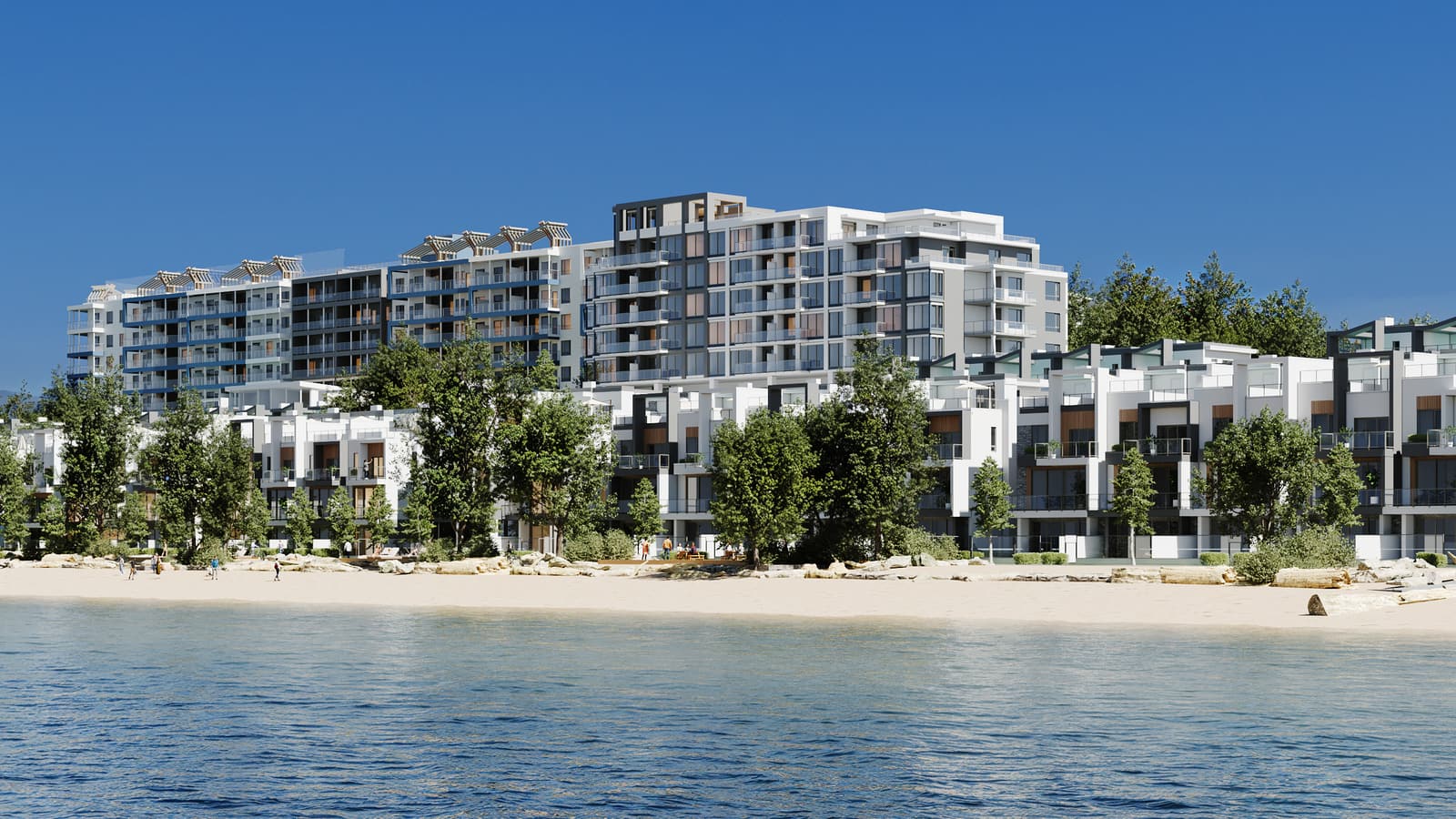 The waterfront villas along the white sand beach with the Waterfront Tower behind, seen from the lake on a sunny day